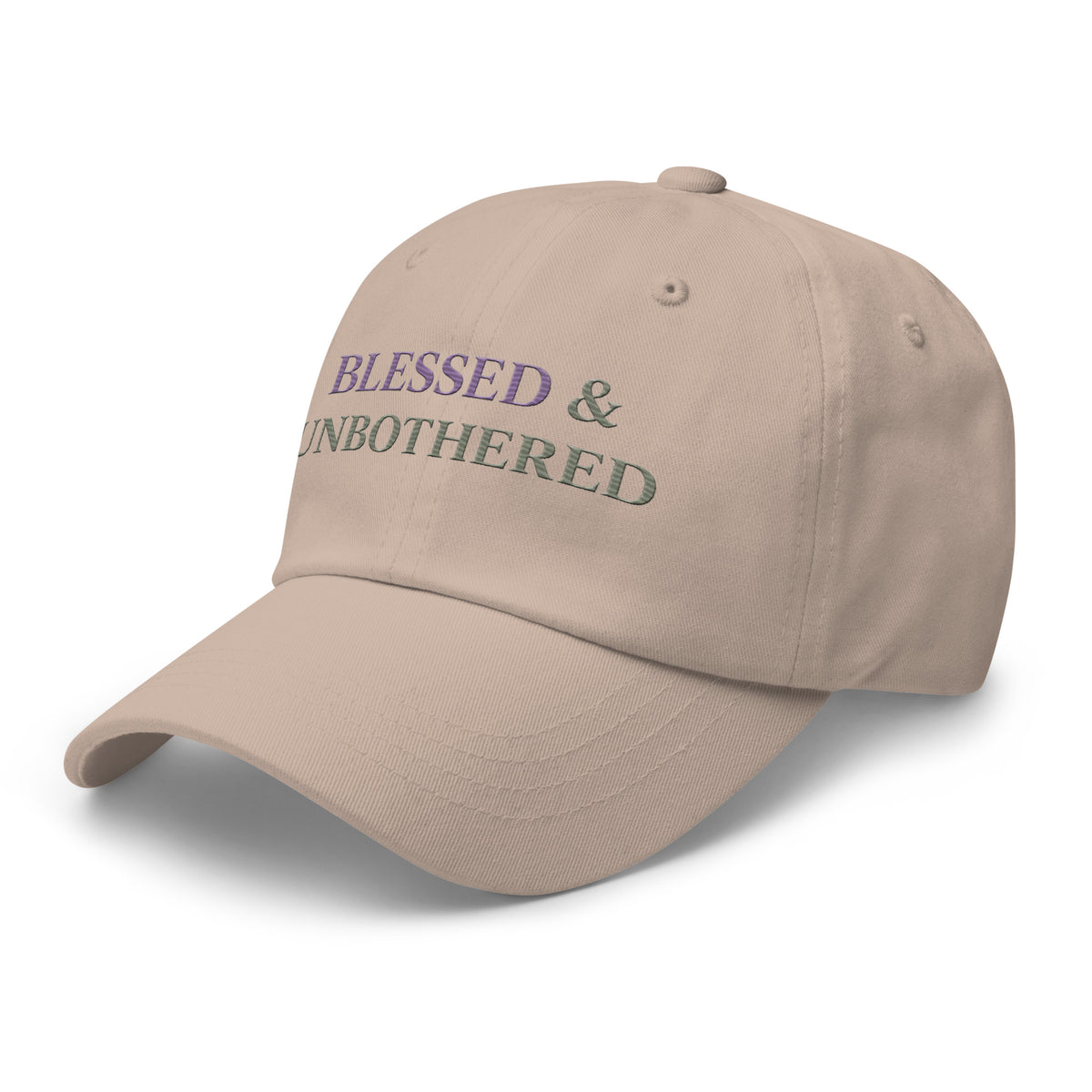 side view of sage green embroidered dad hat with “blessed and unbothered” text in purple, minimal casual accessory
