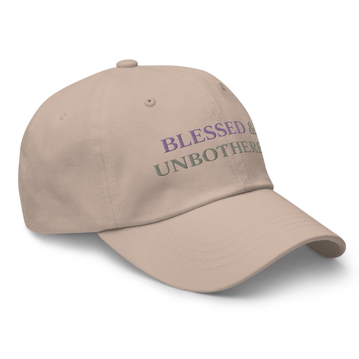 side view of sage green embroidered dad hat with “blessed and unbothered” text in purple, minimal casual accessory
