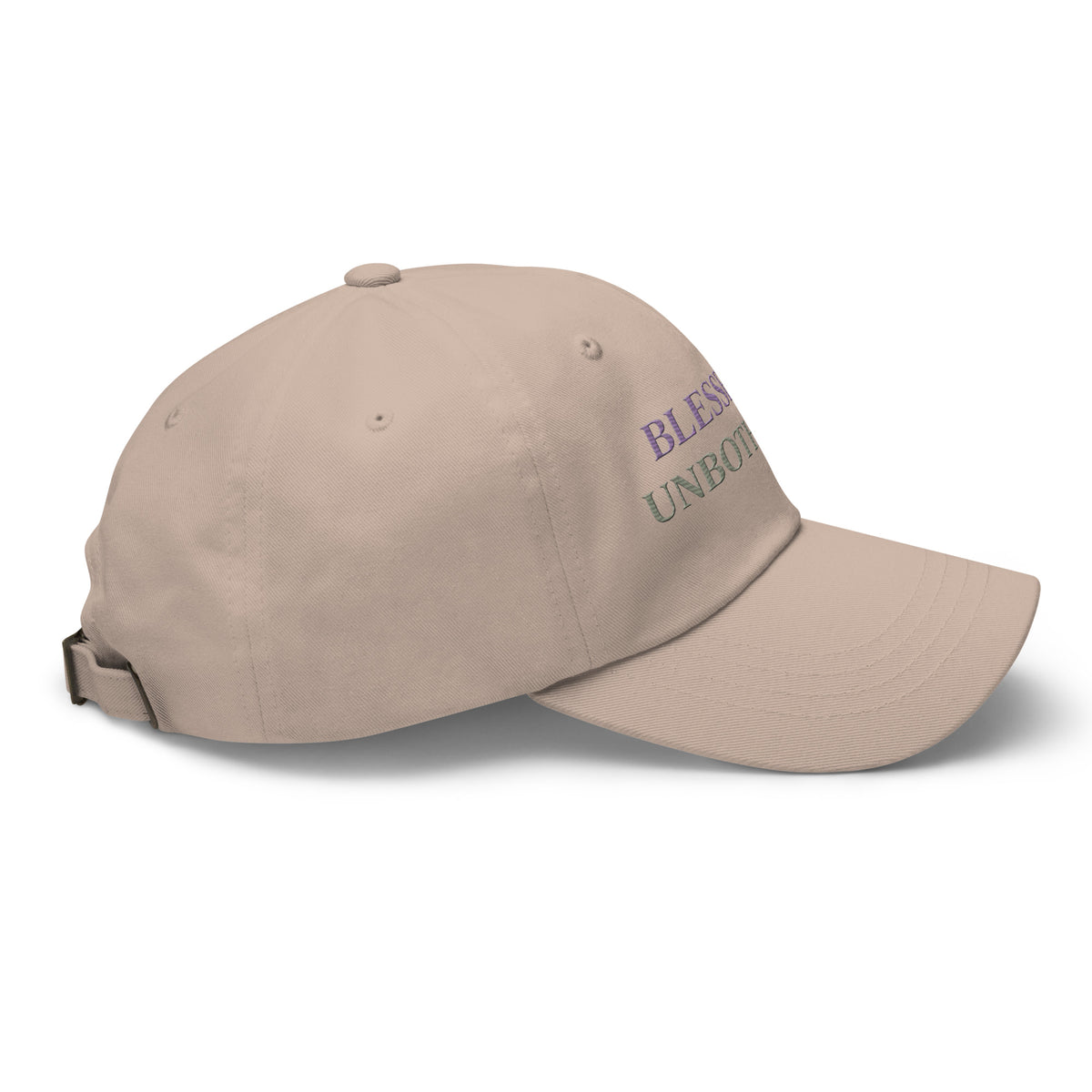 side view of sage green embroidered dad hat with “blessed and unbothered” text in purple, minimal casual accessory
