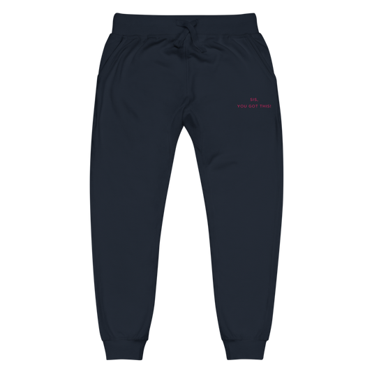 Navy sweatpants with pink text that reads sis, you got this on a white background