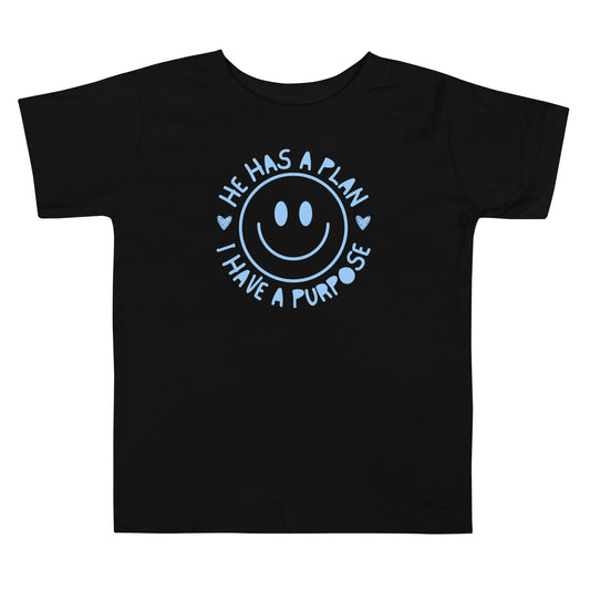 black toddler t-shirt with "He has a plan i Have A purpose" smiley face graphic in blue